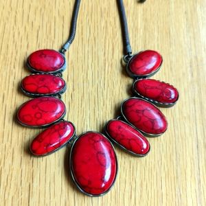 Red stone beaded bib necklace.